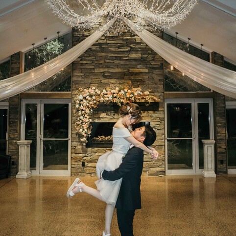 bride and groom dancing