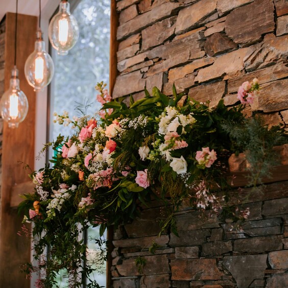 Mantlepiece Floral Display at Fireplace Ceremony Location