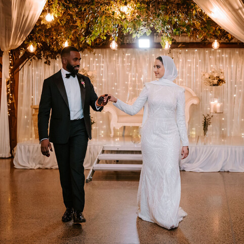 bride and groom dancing