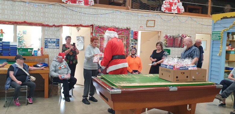 Santa at Achievement House 29Nov22 - Bruised Bros entertaining...