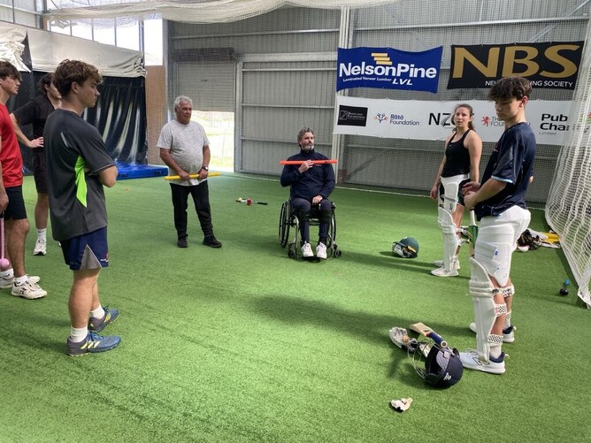Emerging Players group discuss batting stance