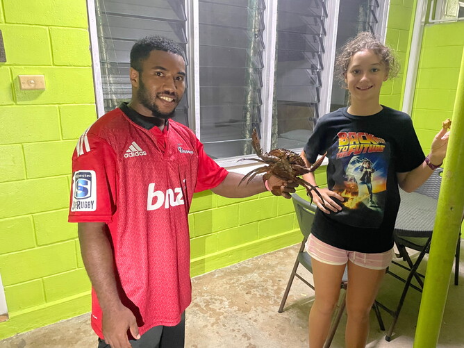 Fijian Josh with his fresh catch for Gabrielle's birthday present!