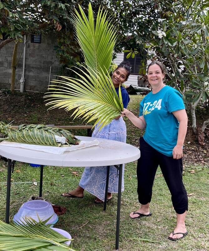 This is Reapi, she has stayed with us recently after we helped her get a job at gymnastics. Here she is on fly-swatting duty with Rachael before the fish goes into the lovo at Oasis Farm!