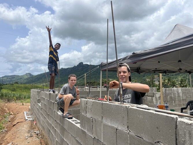 Josh and Caleb helping out at Salochna's