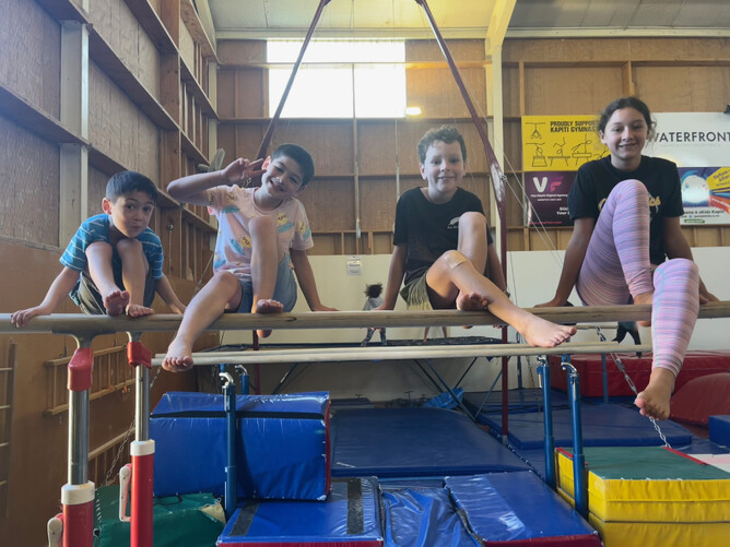 With the cuzzies at a gymnastics holiday programme getting to use all the equipment = Amazing