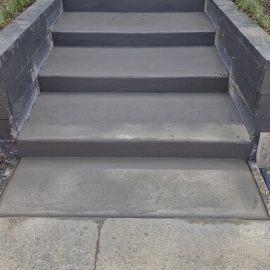 outdoor garden steps with a smooth concrete finish