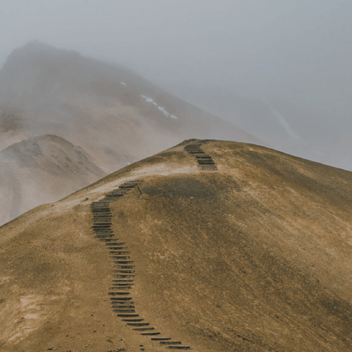 A pathway or trail over a hill for the New 
Christians bible courses
