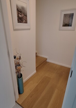 Extensive House Renovation - End of hallway leading to Bedroom 3 - AFTER