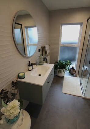Extensive House Renovation - Laundry was transformed into Main Bathroom - AFTER