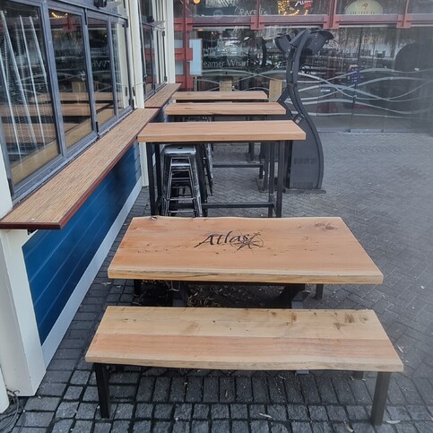 Outdoor seating for Atlas Bar & Kitchen Queenstown by Harwood Joinery.