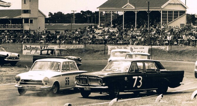Gold Leaf International, Levin, January 1964 – professionals Kerry Grant (Lotus Cortina no 55) and Paul Fahey (Lotus Cortina at right) challenging amateur Ernie Sprague (Ford Zephyr)Credit: Euan Sarginson – author collection