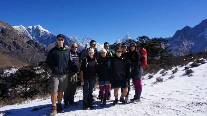 Hiking with a group in Nepal. Mt Everest in the background.
