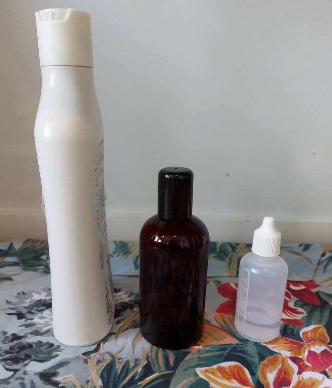 Different sized shampoo bottles to travel light.
