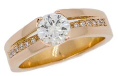 Round Brilliant diamond with round brilliant diamond accents set in 18ct Rose gold, Marc Bendall, engagement rings, Christchurch jewellers