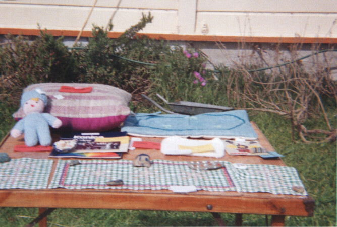 My prize haul from one year's field day. The two embroideries were made at school.