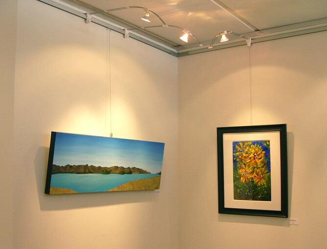 The painting on the left of Lyttelton Harbour is mine