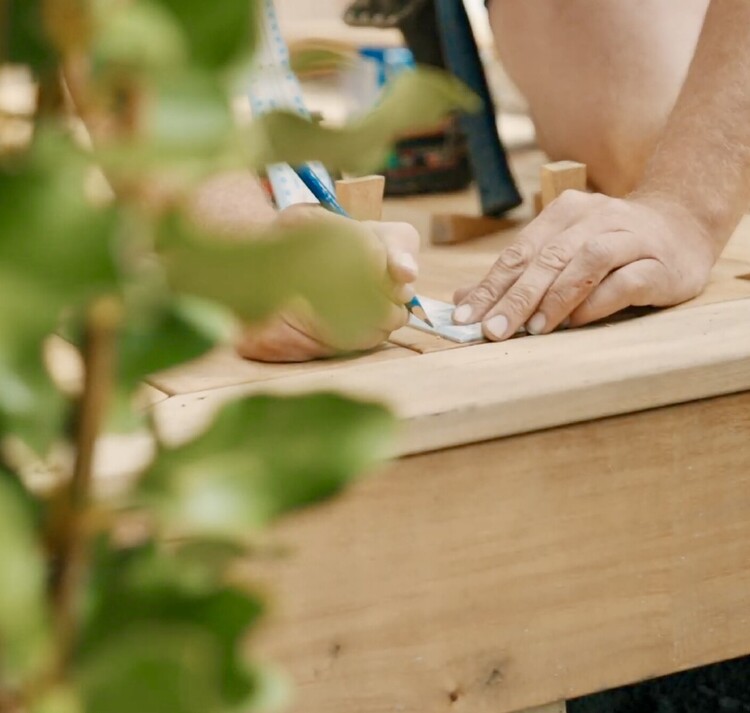 Building a timber deck as part of landscape construction in Nelson
