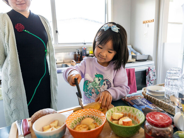 Child preparing food – Montessori practical life, Sunnynook
