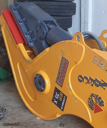 a brand new Italian designed and manufactured Indeco brand hydraulic IFP 35x fixed pulverizer on floor of  warehouse