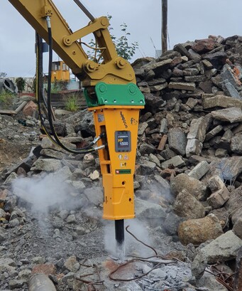 An Indeco hydraulic Rock Breaker / hammer attachment for excavators