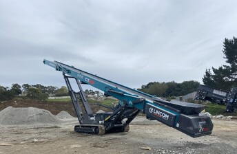 side view of a Powerscreen tracked stacker CT65 65foot on worksite in New Zealand