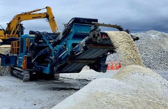 Powerscreen 260SR trackpactor crushing limestone in a quarry in New Zealand