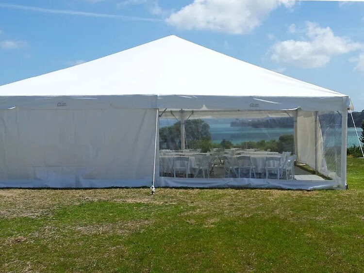 Complete marquee setup with flooring, lighting, tables, and decor – full-service marquee hire Auckland