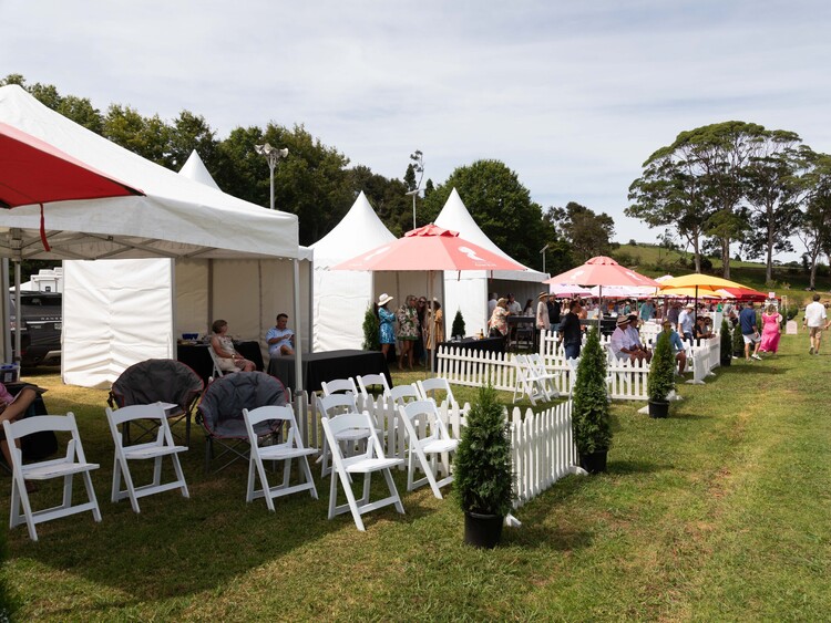 VIP marquee lounge at sports event with seating and refreshments – premium event marquee Auckland