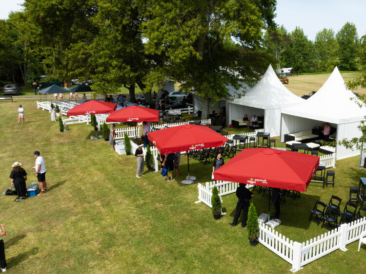 VIP marquee lounge at sports event with seating and refreshments – premium event marquee Auckland