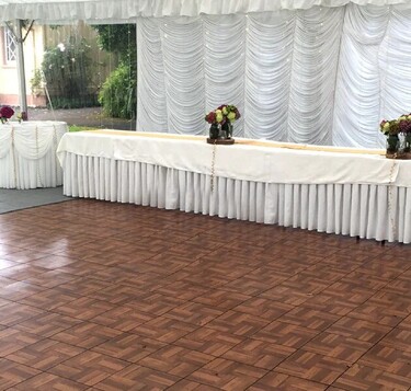 Wooden flooring panels inside event marquee – marquee flooring hire Auckland