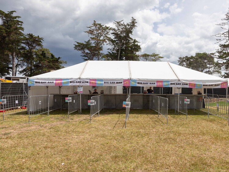 Bar marquee at music festival with crowd service area – event bar tent hire Auckland