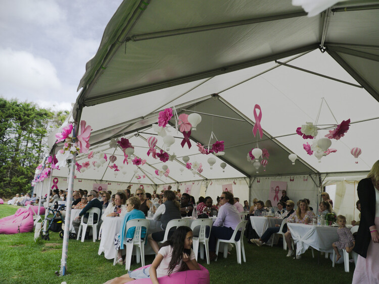VIP marquee lounge at sports event with seating and refreshments – premium event marquee Auckland