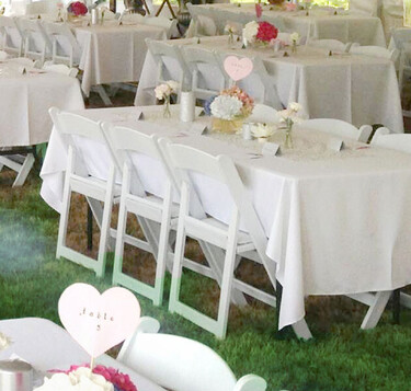 White folding chairs and trestle tables – event and table chair hire Auckland