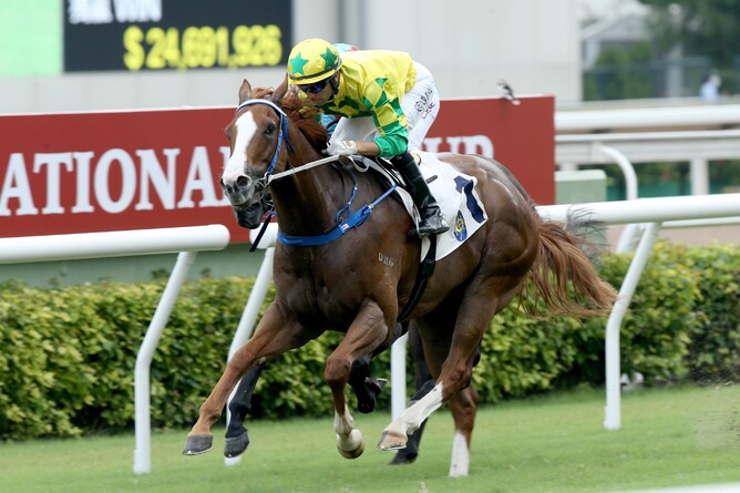 Sky Field brings up a winning hat track at Sha Tin on Thursday. Photo: HKJC