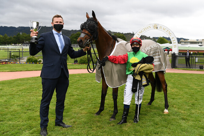 Co-trainer Robert Wellwood and rider Danielle Johnson pose with Cheaperthandivorce after their Trentham victory  - Photo Credit: Race Images – Peter Rubery