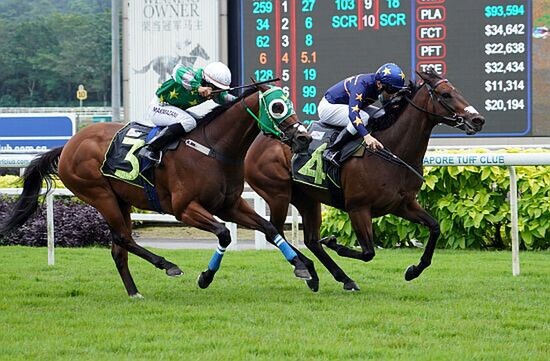 Lim's Kosciuszko (Danny Beasley) holds off Songgong Hera (Akmazani Mazuki) to score on Saturday. - Photo: STC
