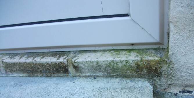 The begining of mould growth at a doorway