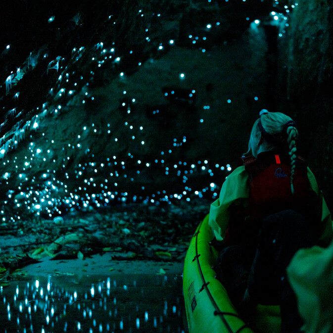 Kayak inside a glow worm cave