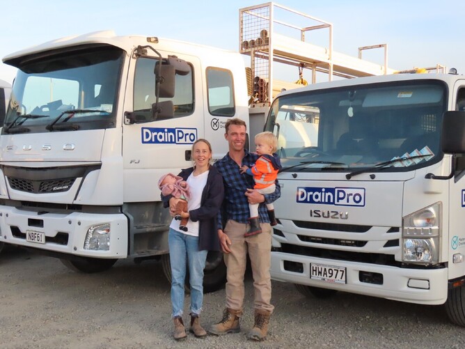 Nathan Williamson poses for a photo with his family.