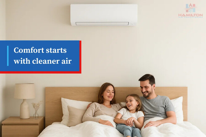 Happy family relaxing under air conditioner with clean indoor air.