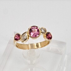 Engagement ring, pink spinels and diamonds