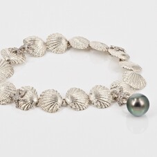 White gold bracelet of shells, starfish and an Australian South Sea pearl