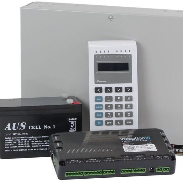 A picture of an alarm kit. Shows alarm panel, external panel, battery and control box.