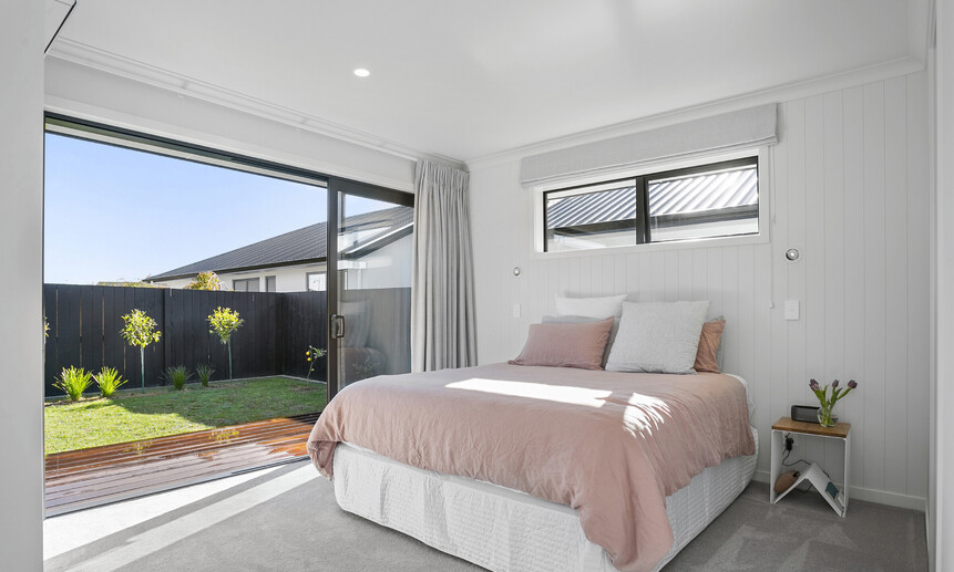 Privacy, light and openness adorn this modern master bedroom in this Gold & Regional House of The Year winner.