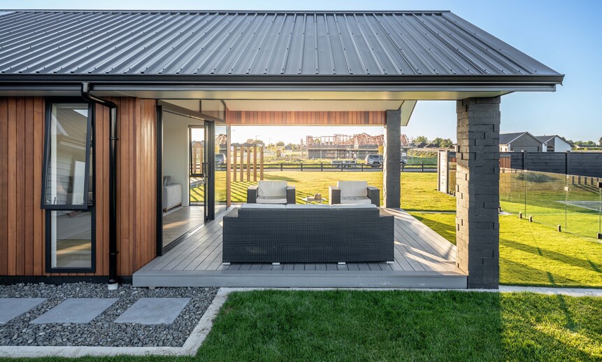 Beautifully built outdoor entertainment area, designed to flow effortlessly from indoors to out in this high-end home.