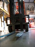 Forklift in warehouse course
