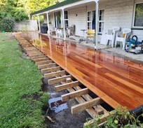 Polished hardwood deck under construction in North Canterbury – high-quality workmanship by trusted deck builders in Christchurch.