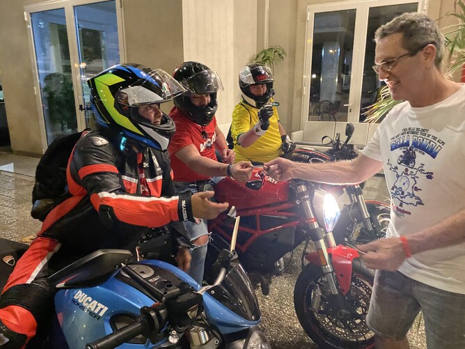 Dishing out stickers after the last dinner with the dodgy Prezzys