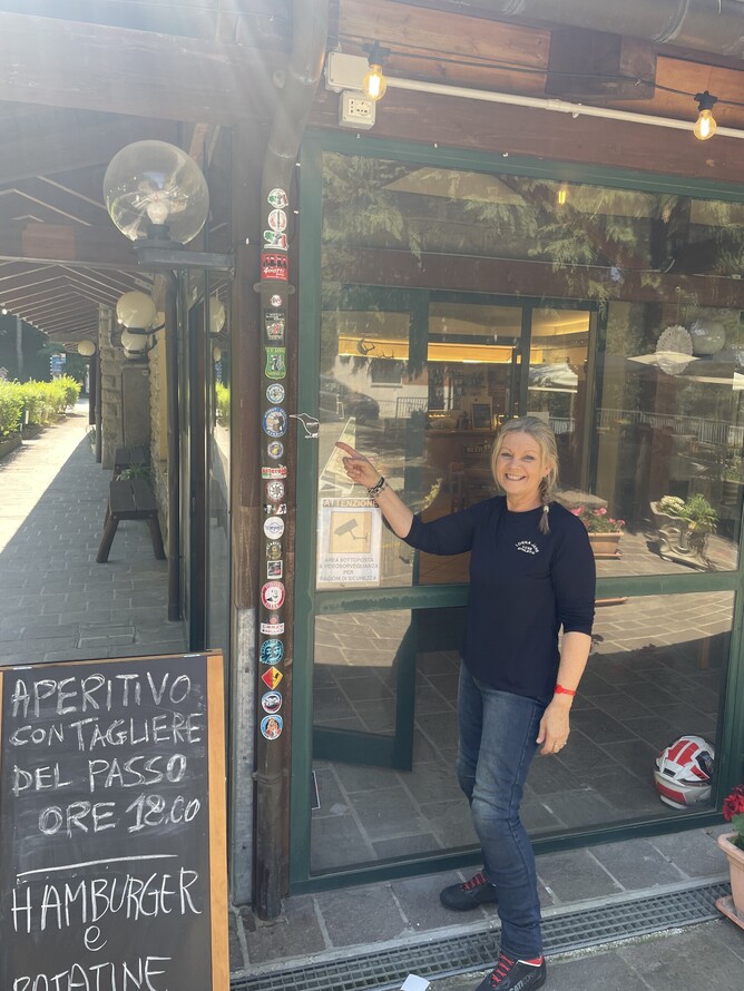 No room on the downpipe at Gamberini - window frame it is!