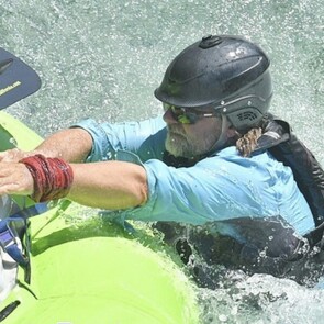 Irish in the water back in his raft guiding days.